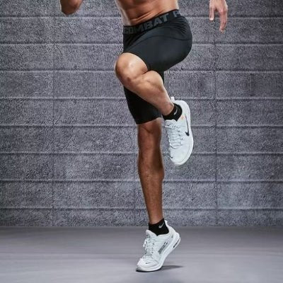 legging homme noir jambe levée yoga zenitude