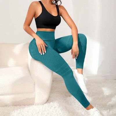 legging sport femme vert assis sur accoudoir divan yoga zenitude