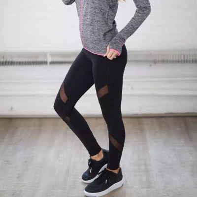 legging sport noir avec bandes insertions transparentes vue légèrement sur côté yoga zenitude