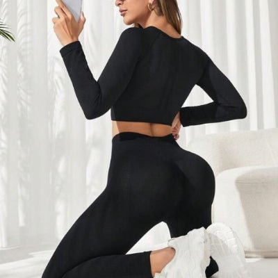 Tenue yoga noire vue de dos yoga zenitude